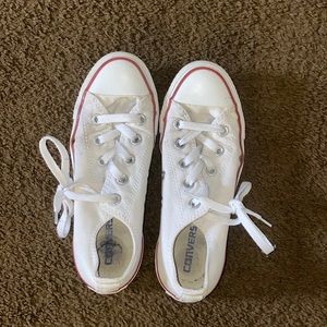 White Converse low top shoes